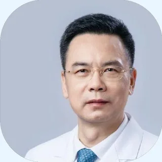 Official portrait of Chen Minhu, President of Shenzhen Qianhai Taikang Hospital, chief physician in white coat.